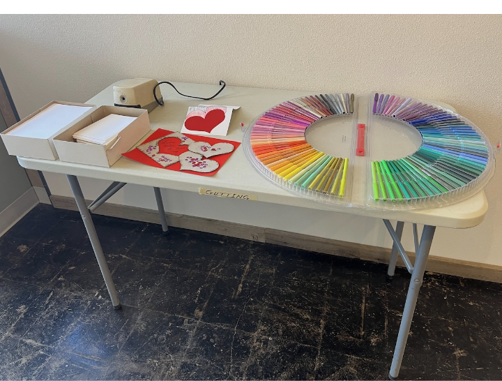 Photo of valentine art supplies on table