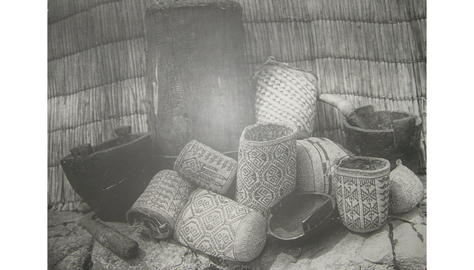 Photo of 8 patterned basked and two wooden bowls indie traditional matted dwelling